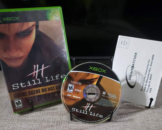 Xbox game disc and case on a textured surface