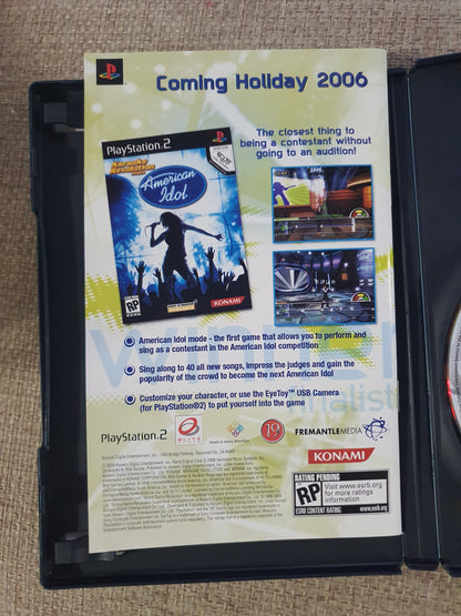PlayStation 2 game case with promotional text and graphics on a textured surface