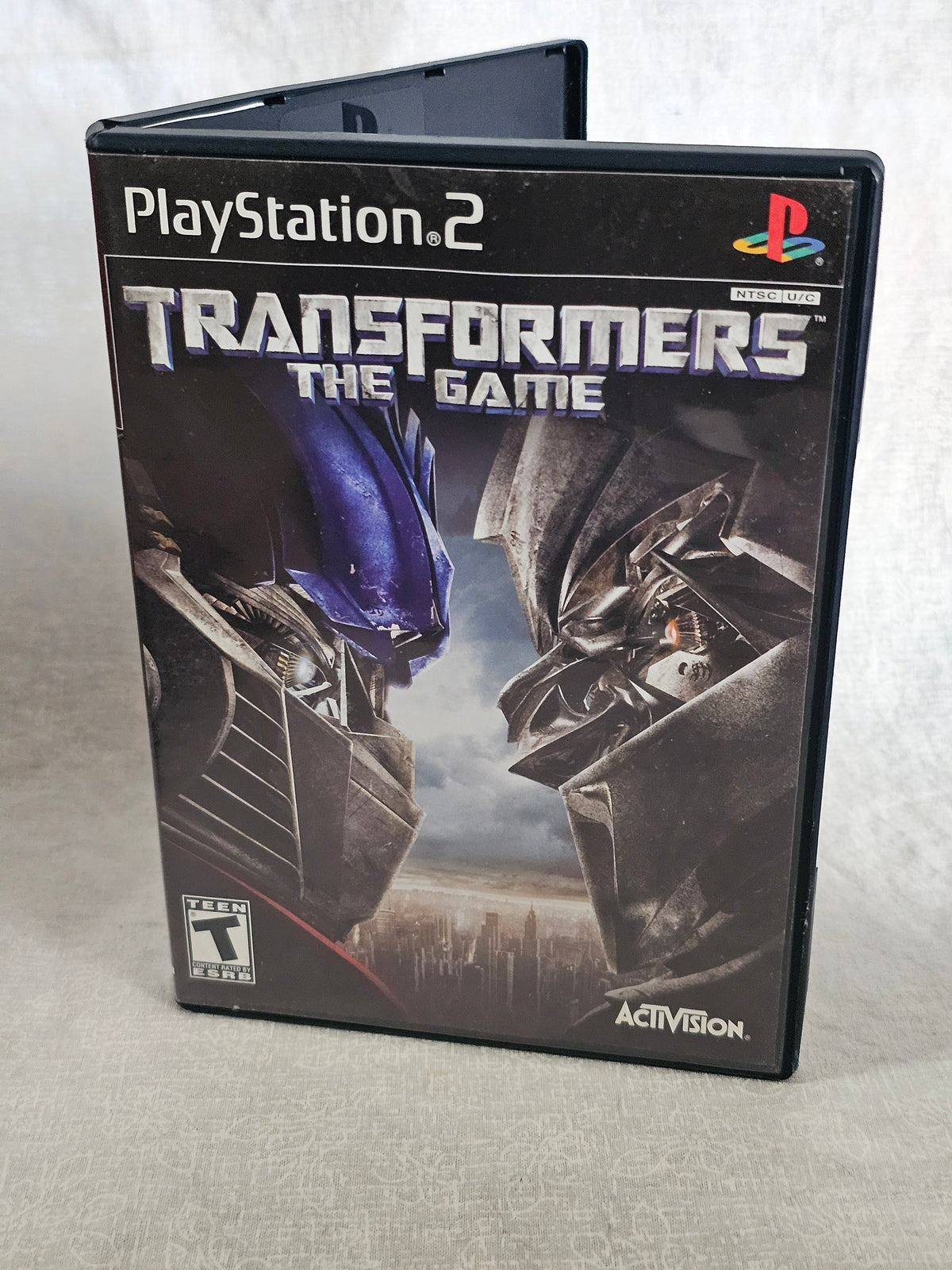 Transformers The Game PS2 PlayStation 2 2007 Activision Disc Complete Tested Movie Tie Autobots Decepticons Collector Edition Action Adventure