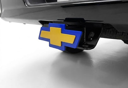 Chevy hitch cover on a vehicle with a Texas license plate