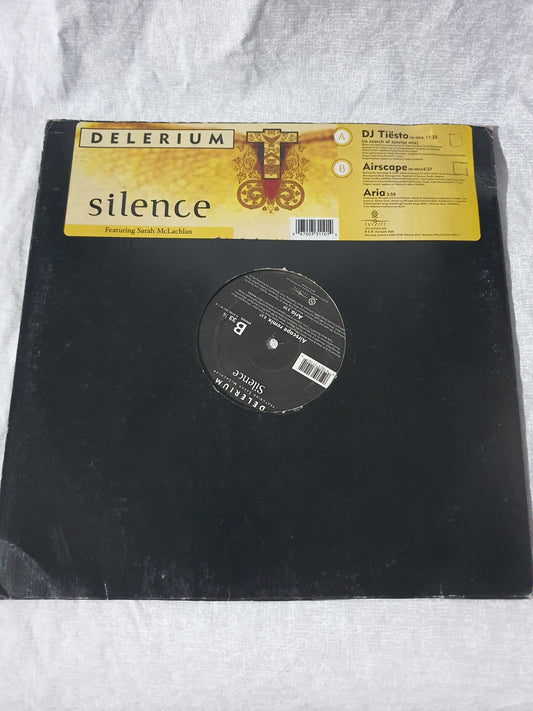 Vinyl record with a yellow label on a white textured background