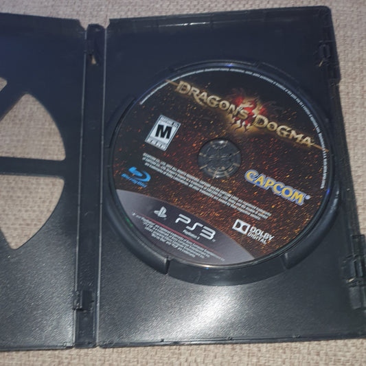 PlayStation 3 game disc in a case on a beige surface