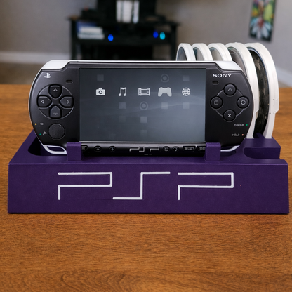 PSP console on a purple stand with a blurred TV in the background