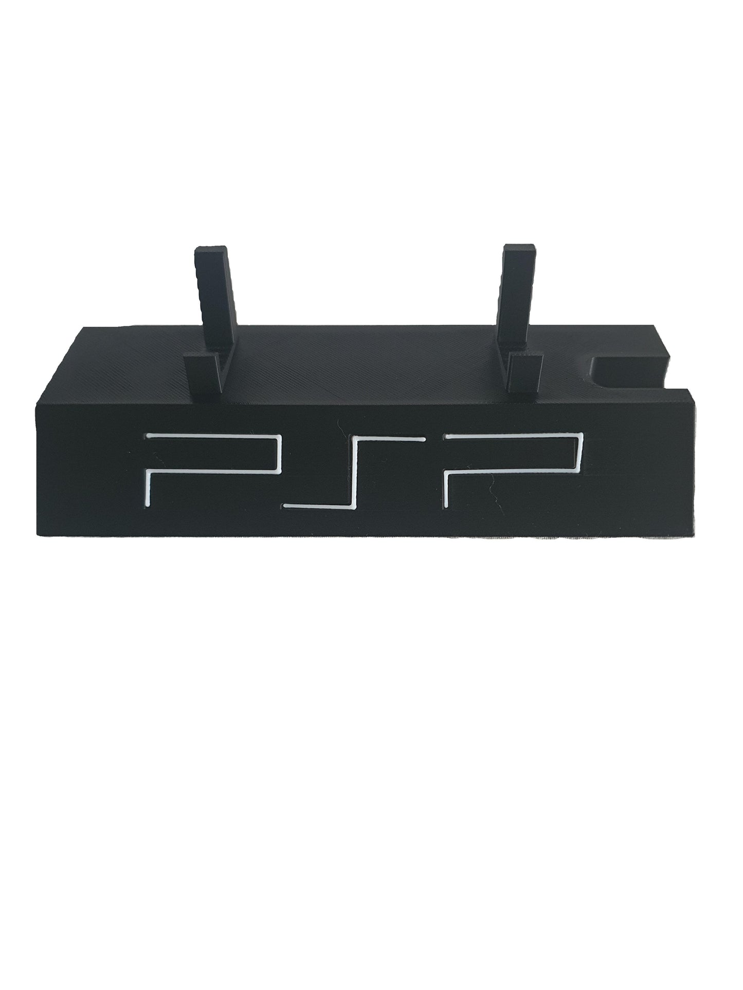 Black electronic device with 'PSP' branding on a white background